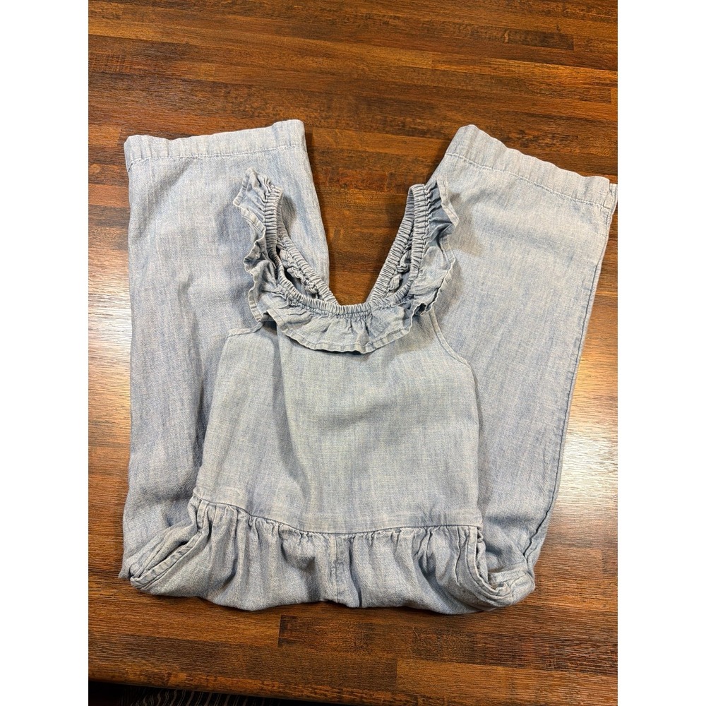 Gap kids chambray jumper. Smocked back with ruffled shoulder straps.  Size 6/7.